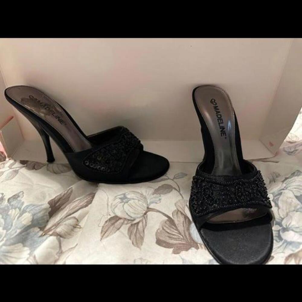 Step up your formal game with sleek black kitten heels